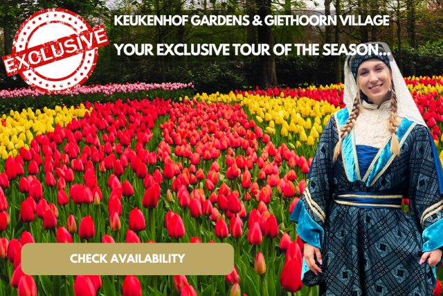 A Woman In A Holland Dress Posing For A Picture In The Keukenhof Tulip Gardens